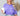 Purple shirt that says I just want to drink coffee and pet my dog shirt modeled by a woman sitting and holding a coffee cup.