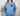 Cavalier King Charles Spaniel light blue sweatshirt modeled by a woman standing in her living room with her hands in her pockets.