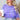 Purple shirt that says I just want to drink coffee and pet my dog shirt modeled by a woman sitting and holding a coffee cup.