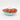 A plush dog toy resembling a pumpkin pie.